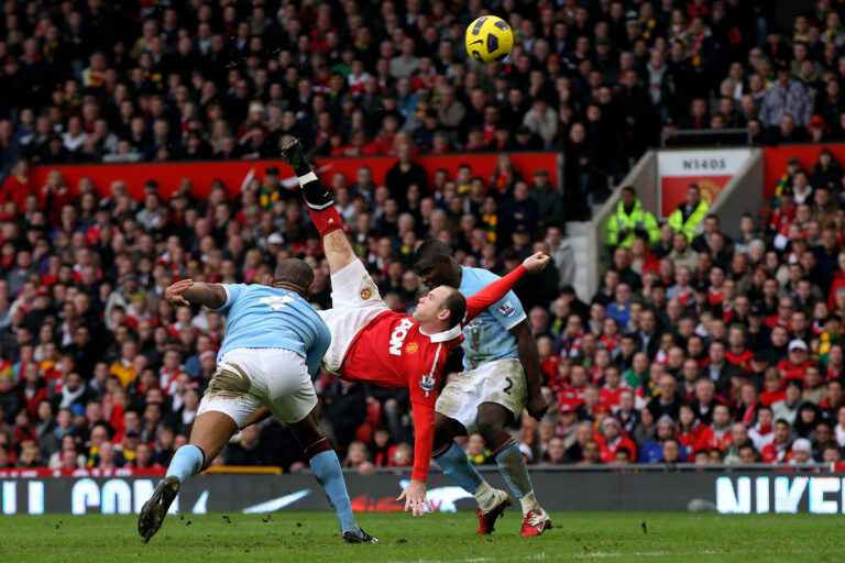 MANCHESTER, ENGLAND - FEBRUARY 12:  Wayne Rooney of Manchester United scores a goal from an overhead kick during the Barclays Premier League match between Manchester United and Manchester City at Old Trafford on February 12, 2011 in Manchester, England.  (Photo by Alex Livesey/Getty Images)